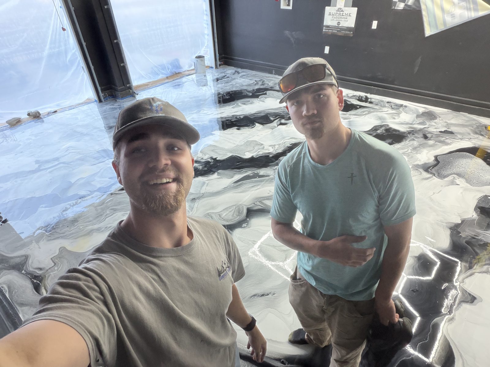Saltwater Epoxy team on a black and white floor project