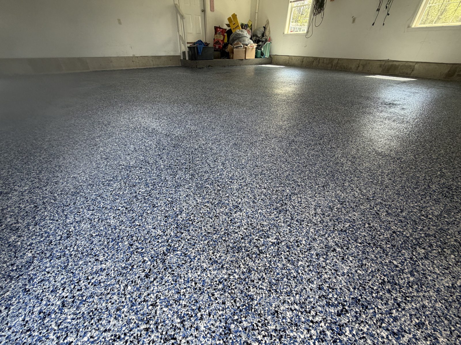 Garage floor with blue flake epoxy finish