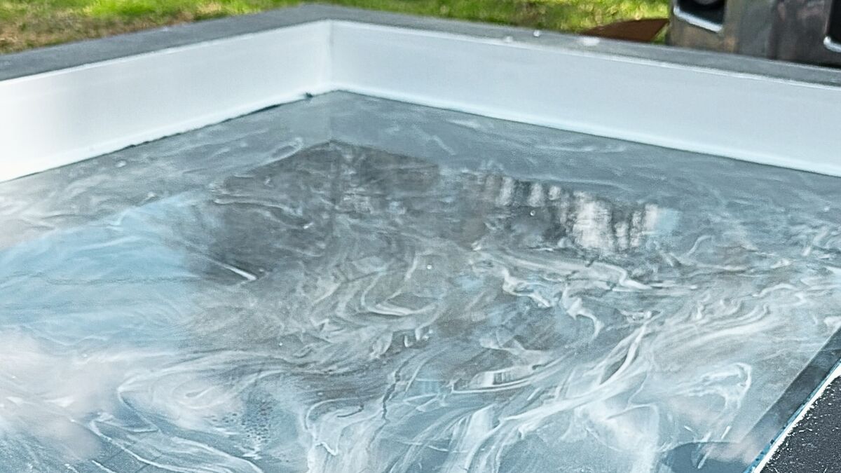 Metallic epoxy swirl finish